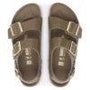 Milano Rivet Logo in pelle naturale goffrata Milano Rivet Logo in pelle naturale goffrata